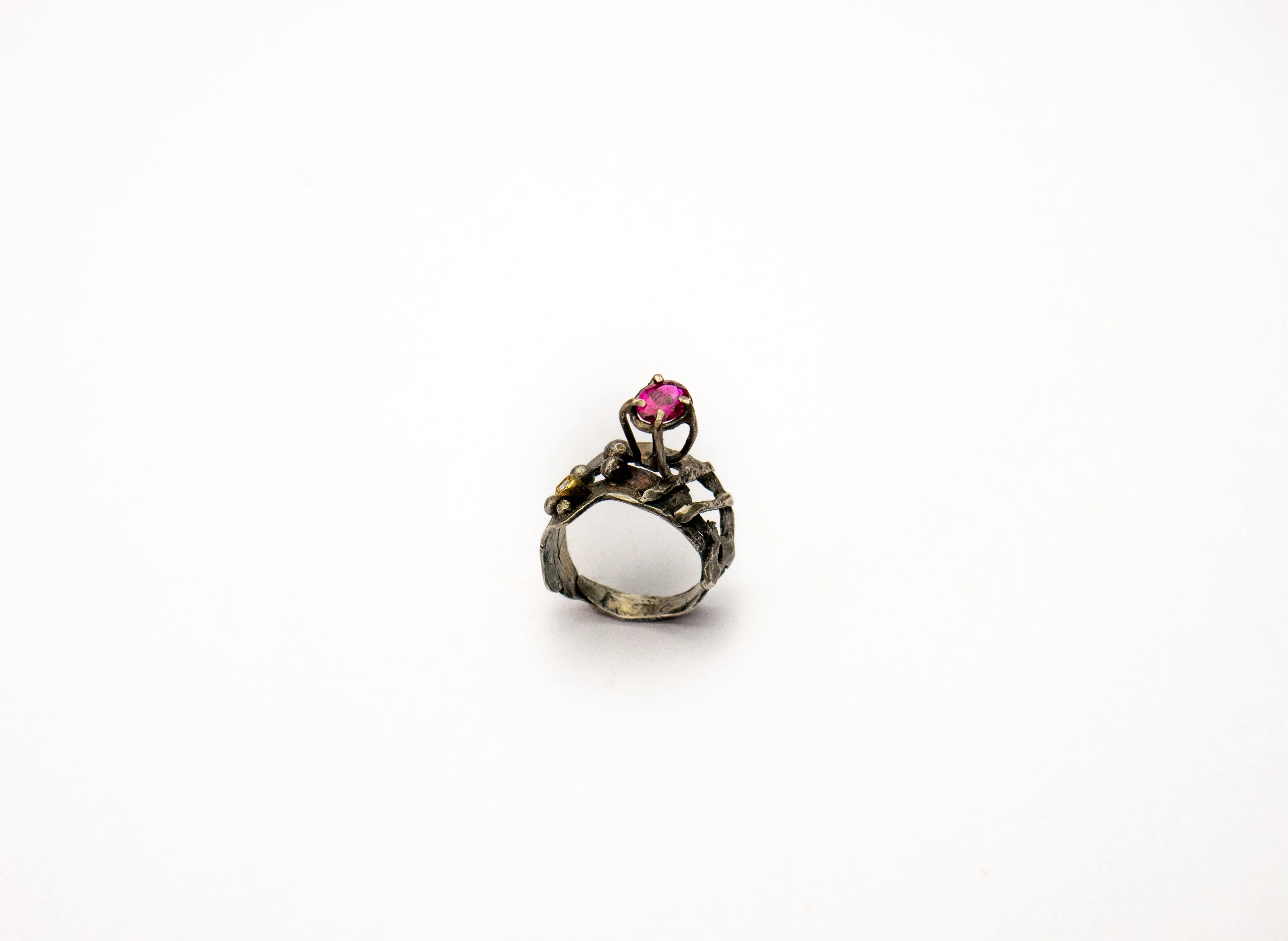 Organic sterling silver ring set with garnet