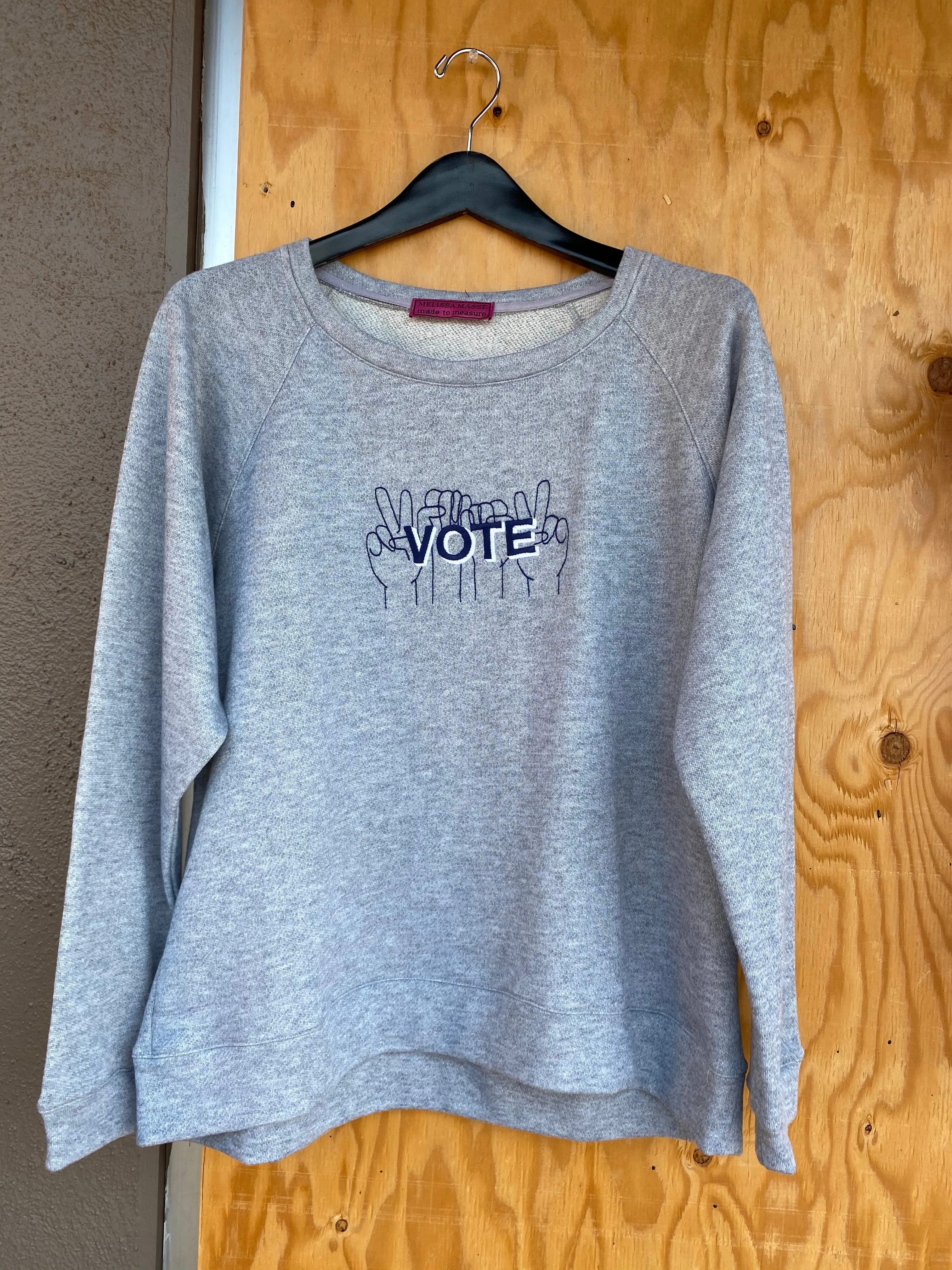 VOTE embroidered organic sweatshirt in pale pink