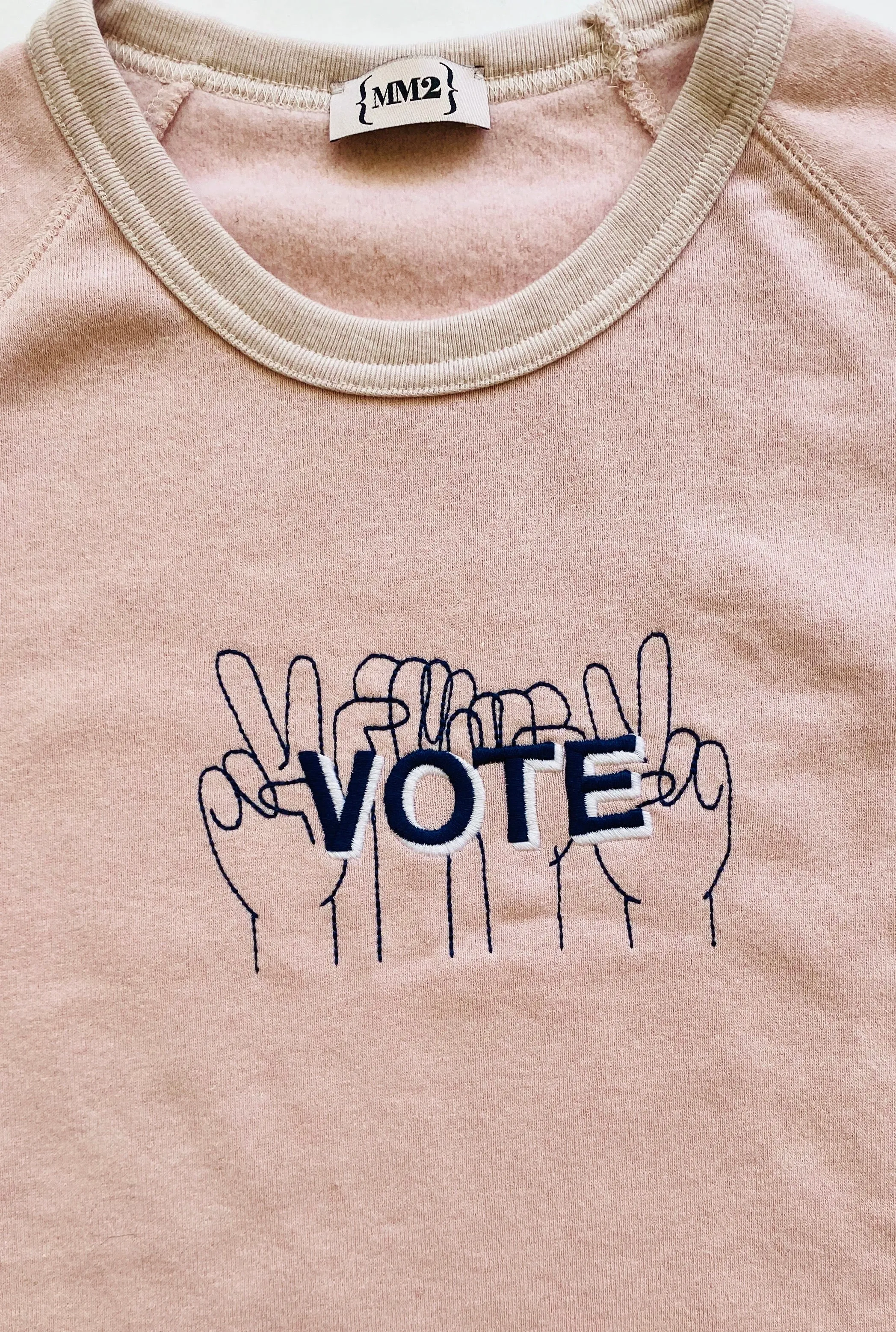 VOTE embroidered organic sweatshirt in pale pink