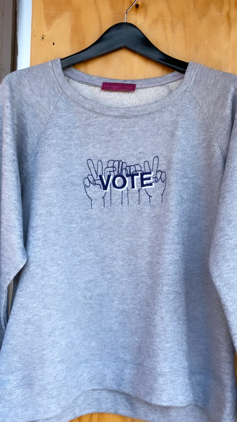 VOTE embroidered organic sweatshirt in pale pink